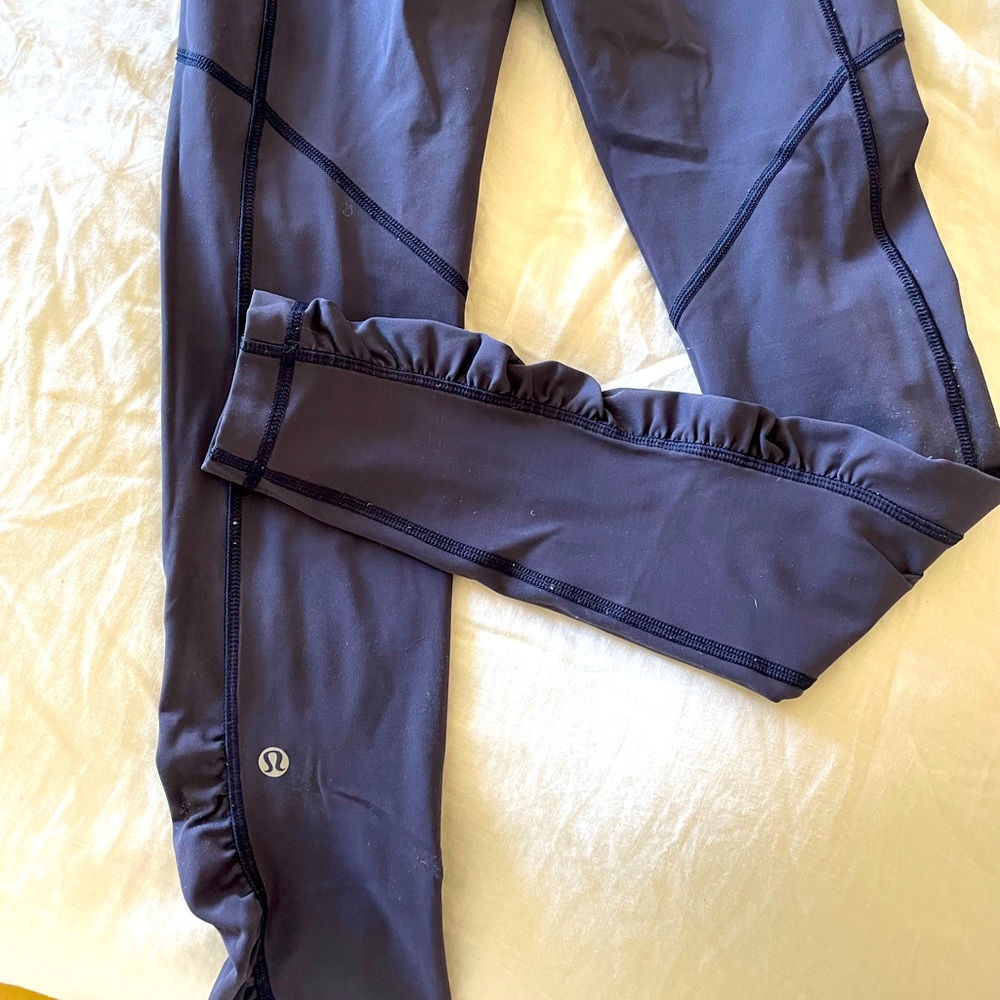 Lululemon Running Tight size 4 (but I’m a size 6 in todays sizing and these fit)
